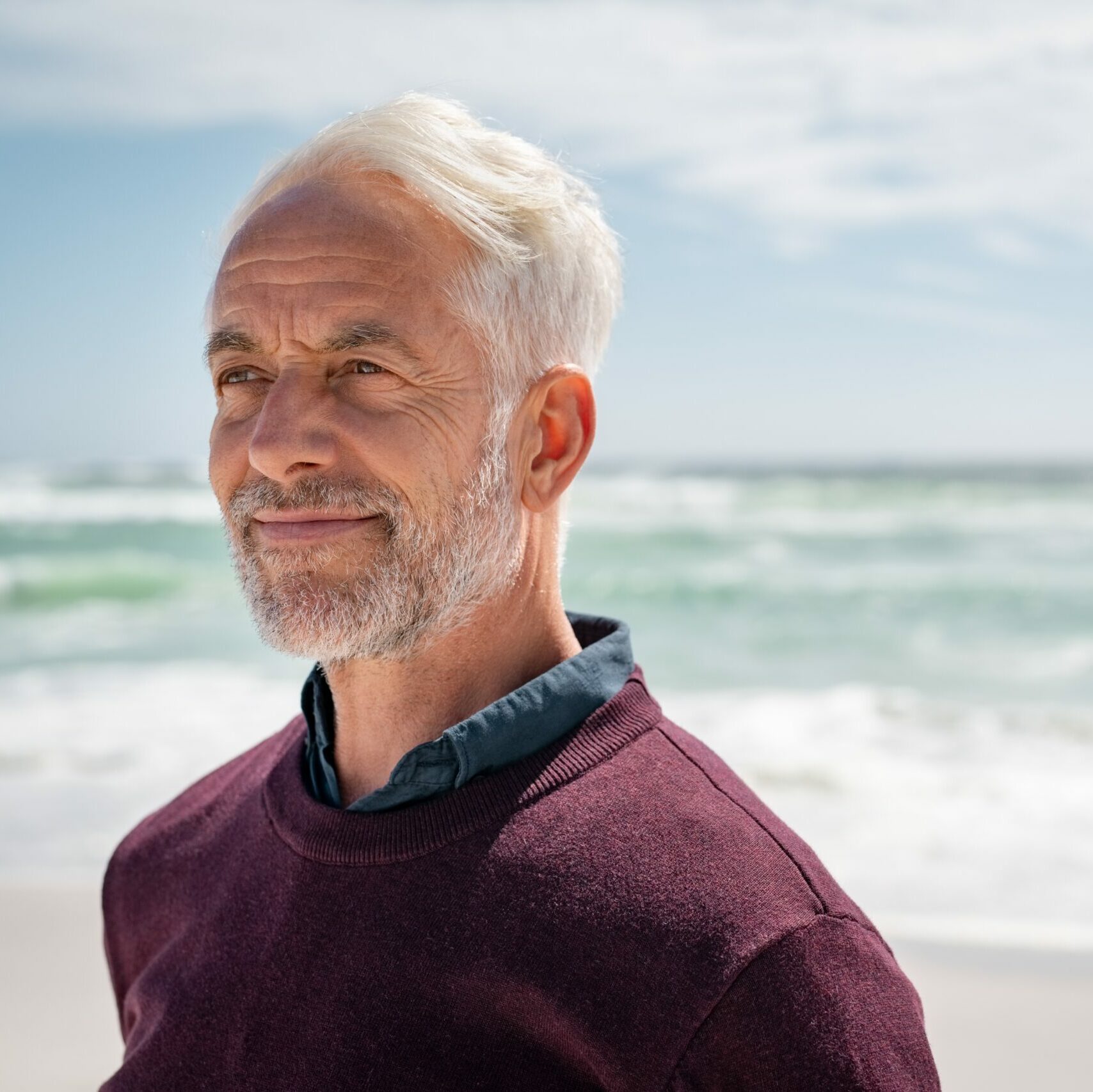 Portrait,Of,Pensive,Senior,Man,At,Beach,Looking,Away.,Proud