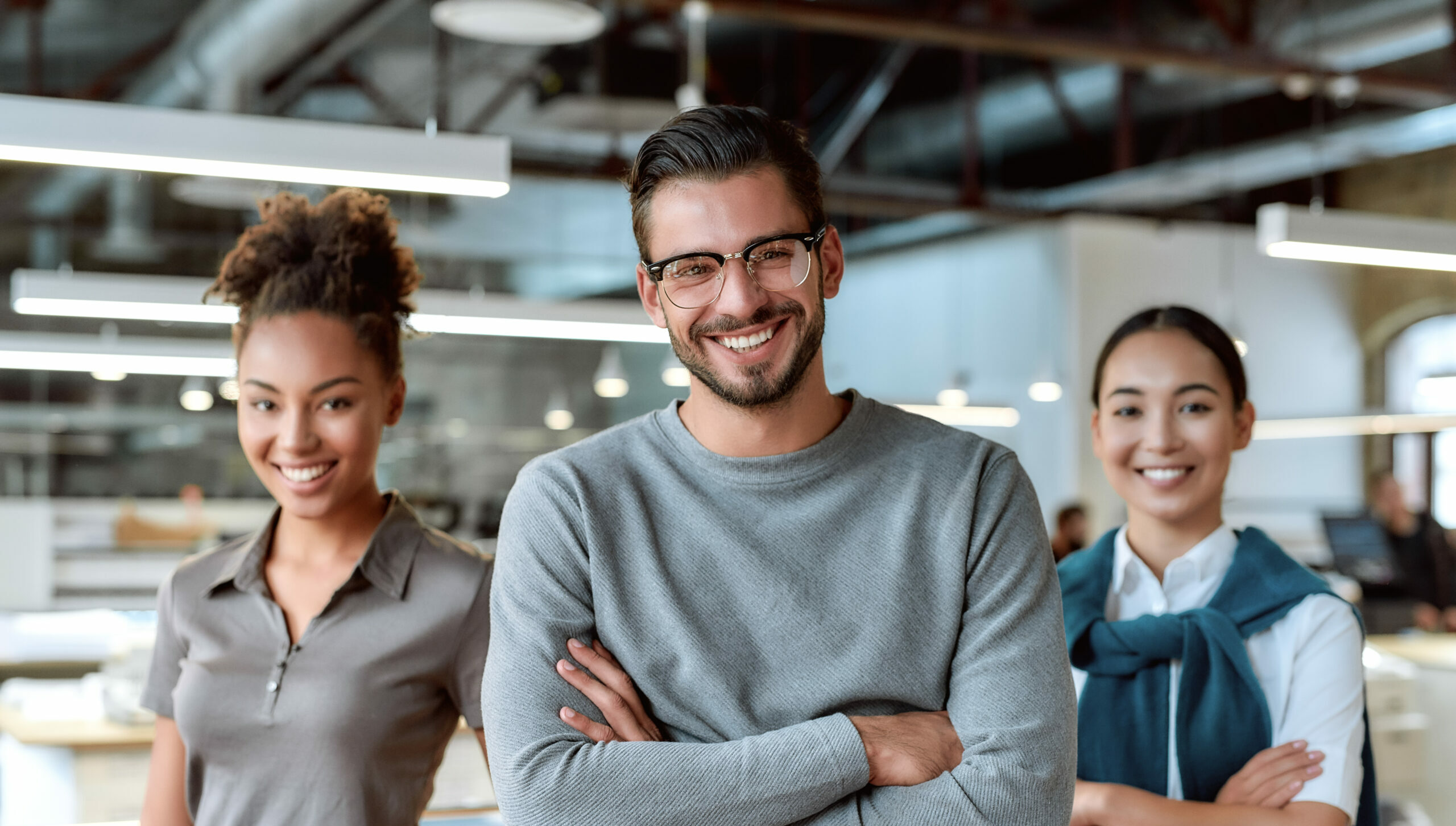 Portrait,Of,Three,Co-workers,In,Casual,Wear.,Two,Women,And